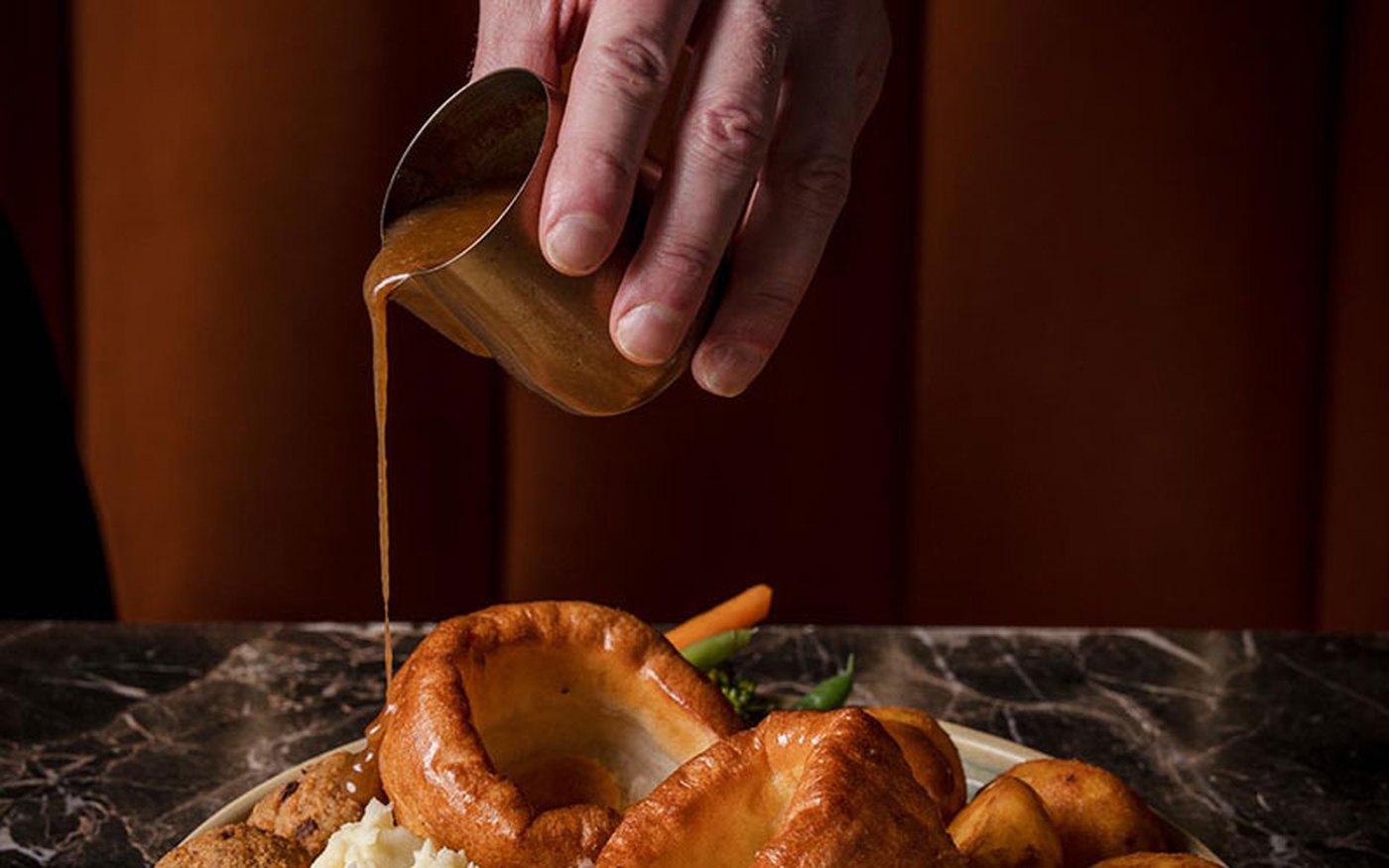 Halal Sunday roast with Yorkshire pudding and roast potatoes at Decorum Birmingham