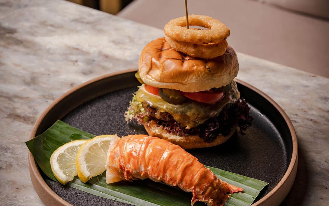 Gourmet halal burger and king prawn lunch plate at Decorum Birmingham Jewellery Quarter